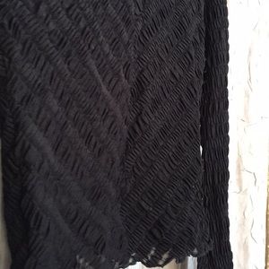 Sheer, stretchy long sleeve top